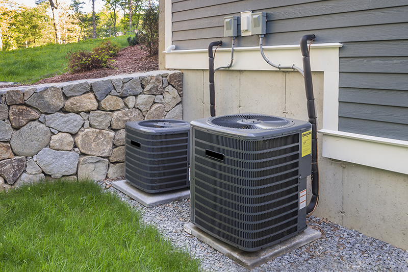 Air conditioning units seen while completing 4 point home inspection services 